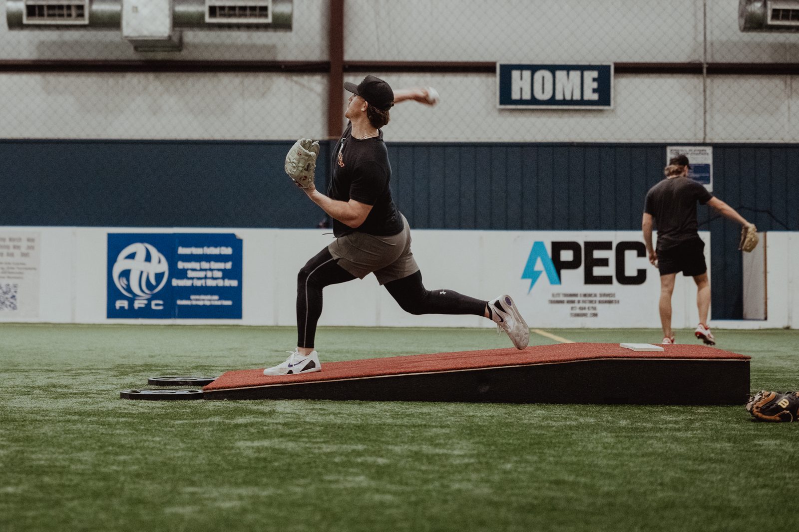 Pitcher in foot strike off the mound at APEC